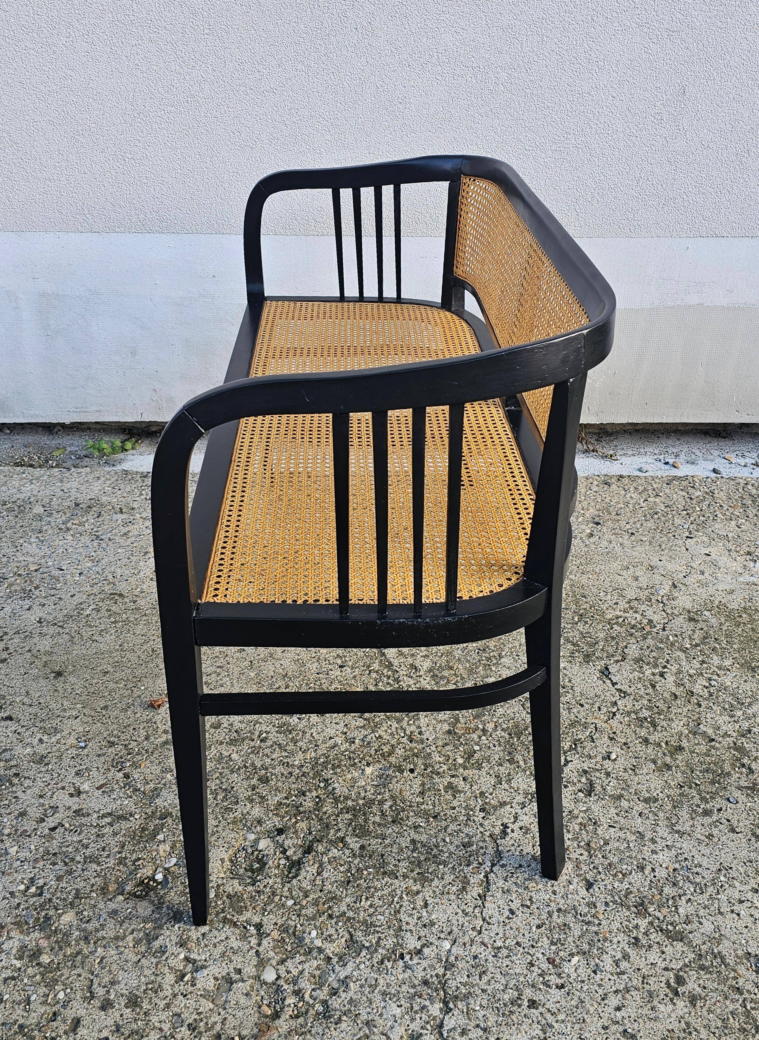 Vienna Secession beech canapé with cane seat and backrest.
