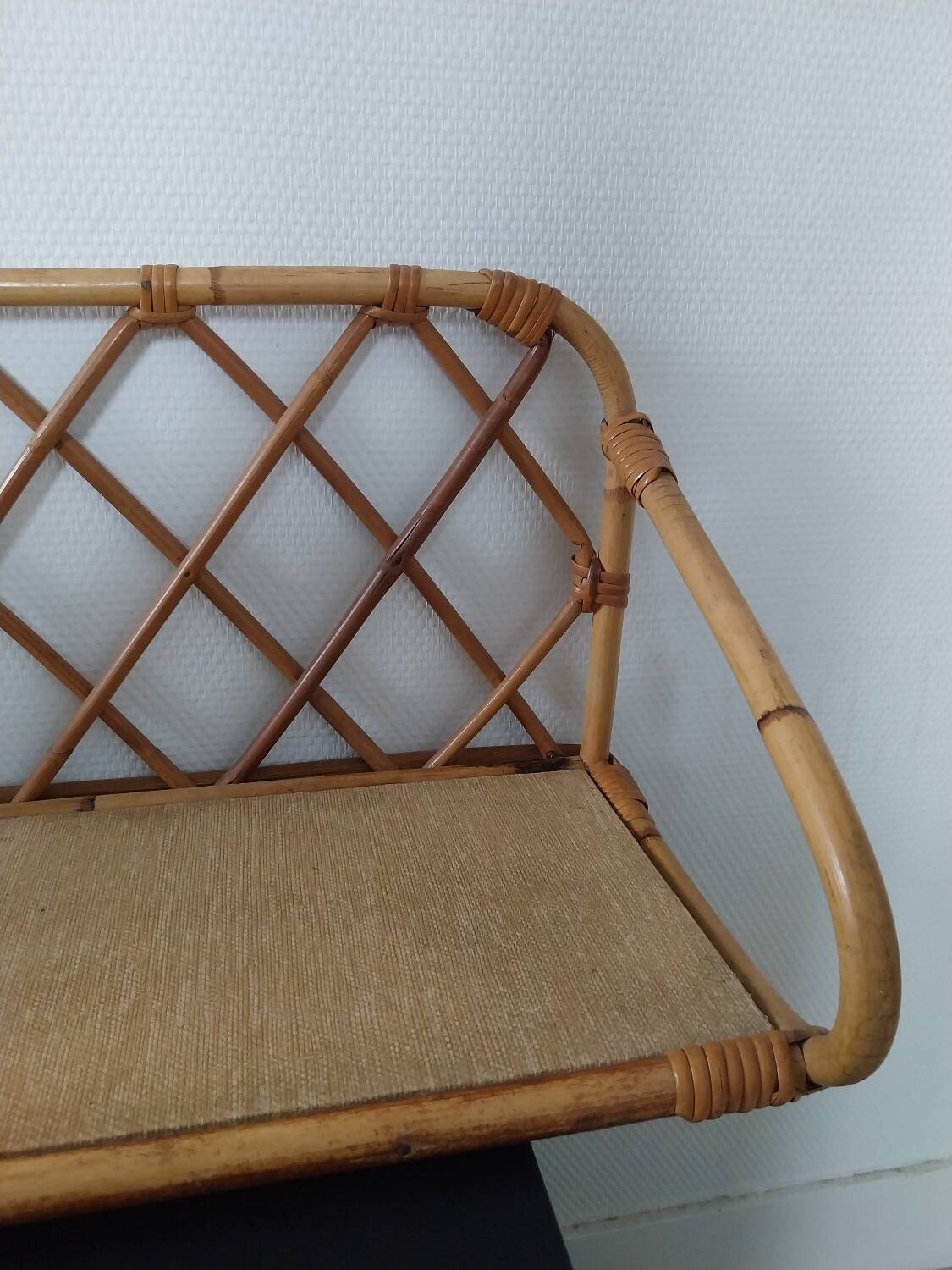 Rattan wall shelf