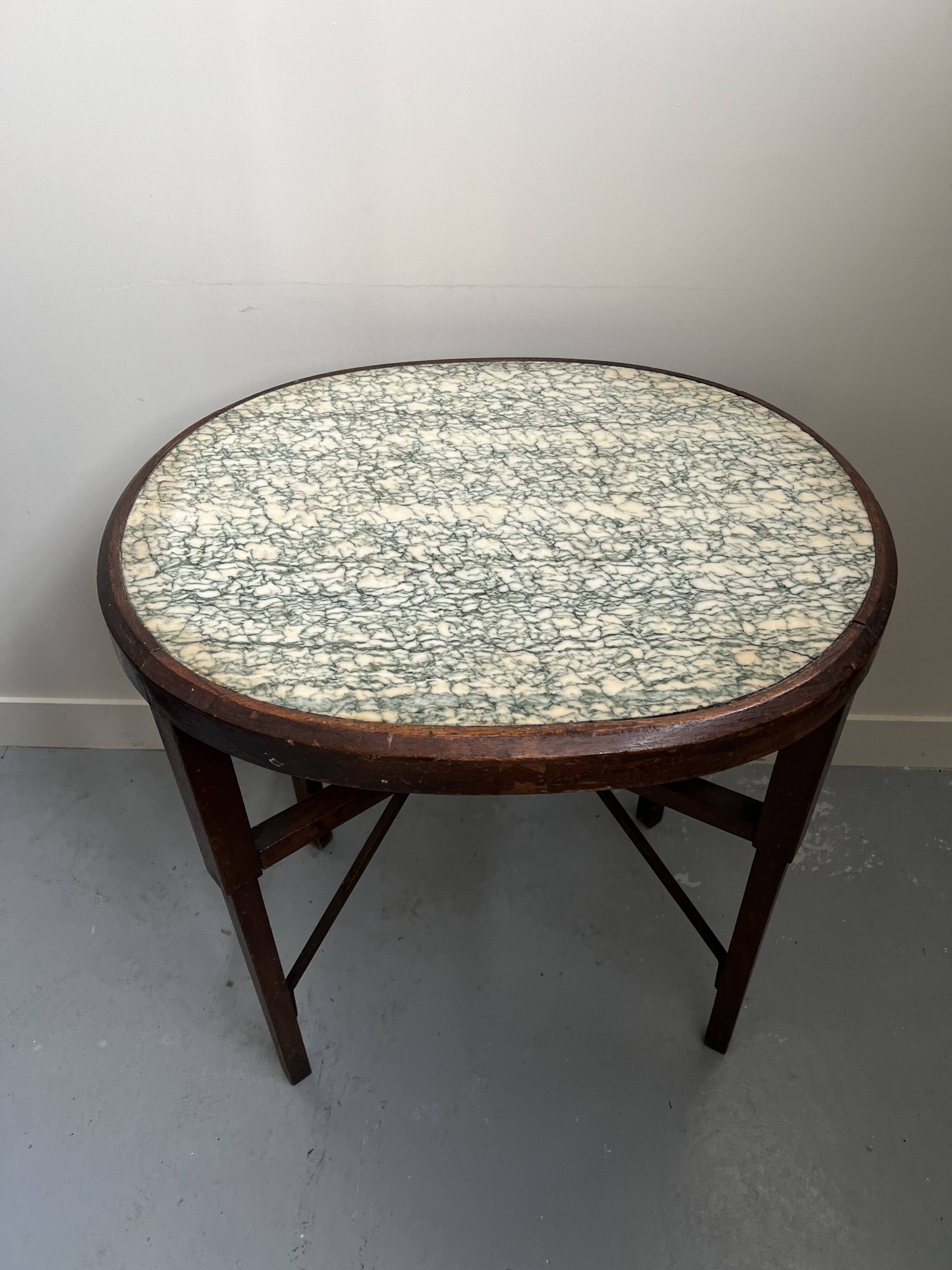 Art Nouveau oval table with marble top, late 19th century