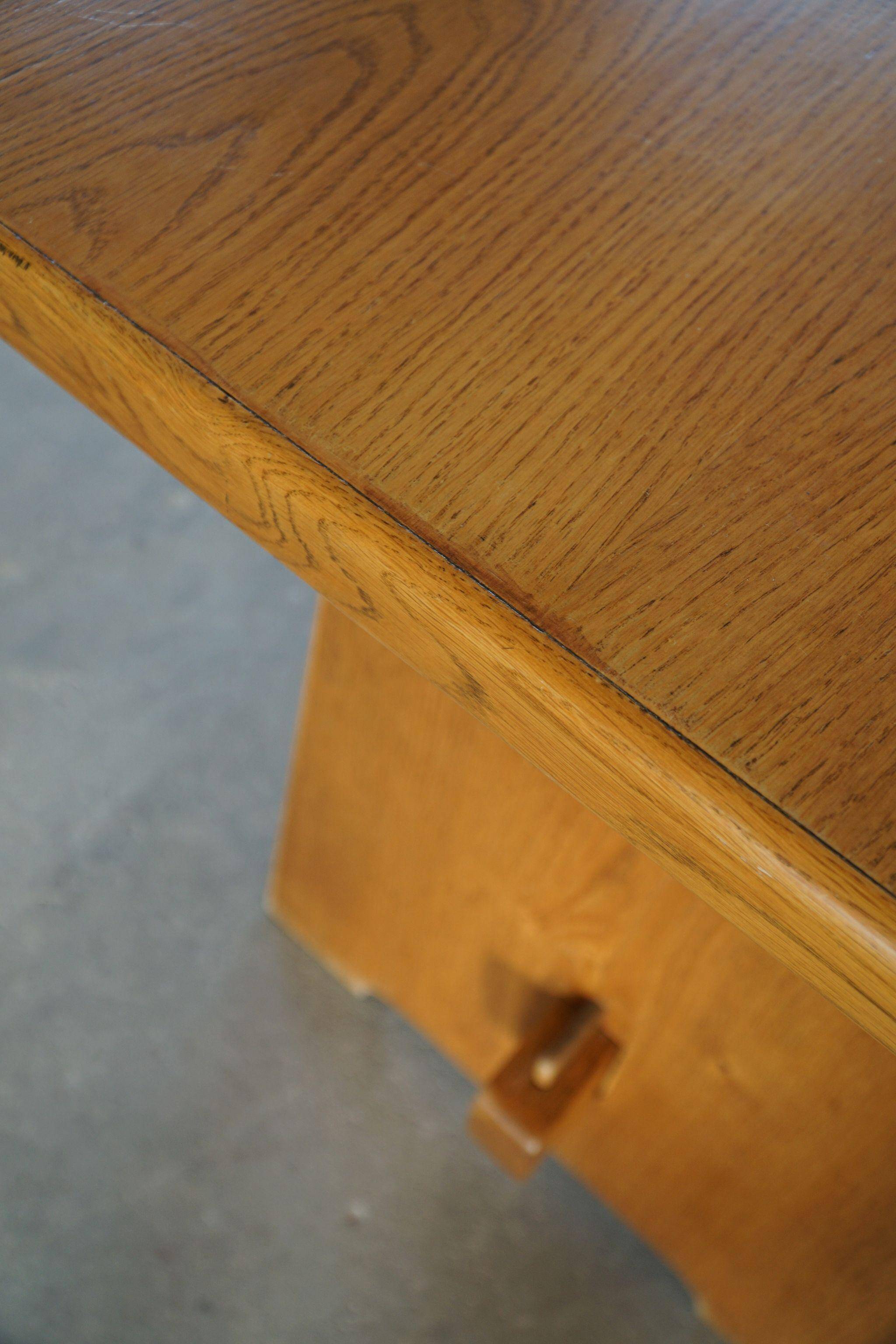Mid-century brutalist dining table, made of oak, Danish craftsmanship, 1950s.