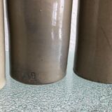 Trio of vintage stoneware bottles