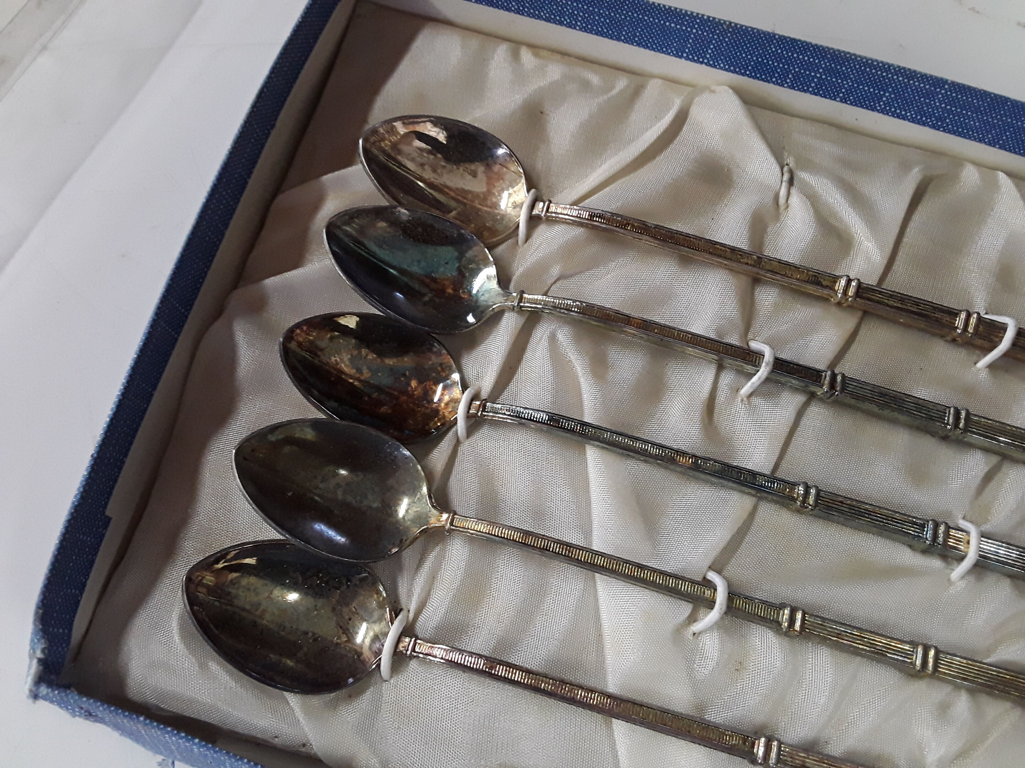 Old box with five spoons