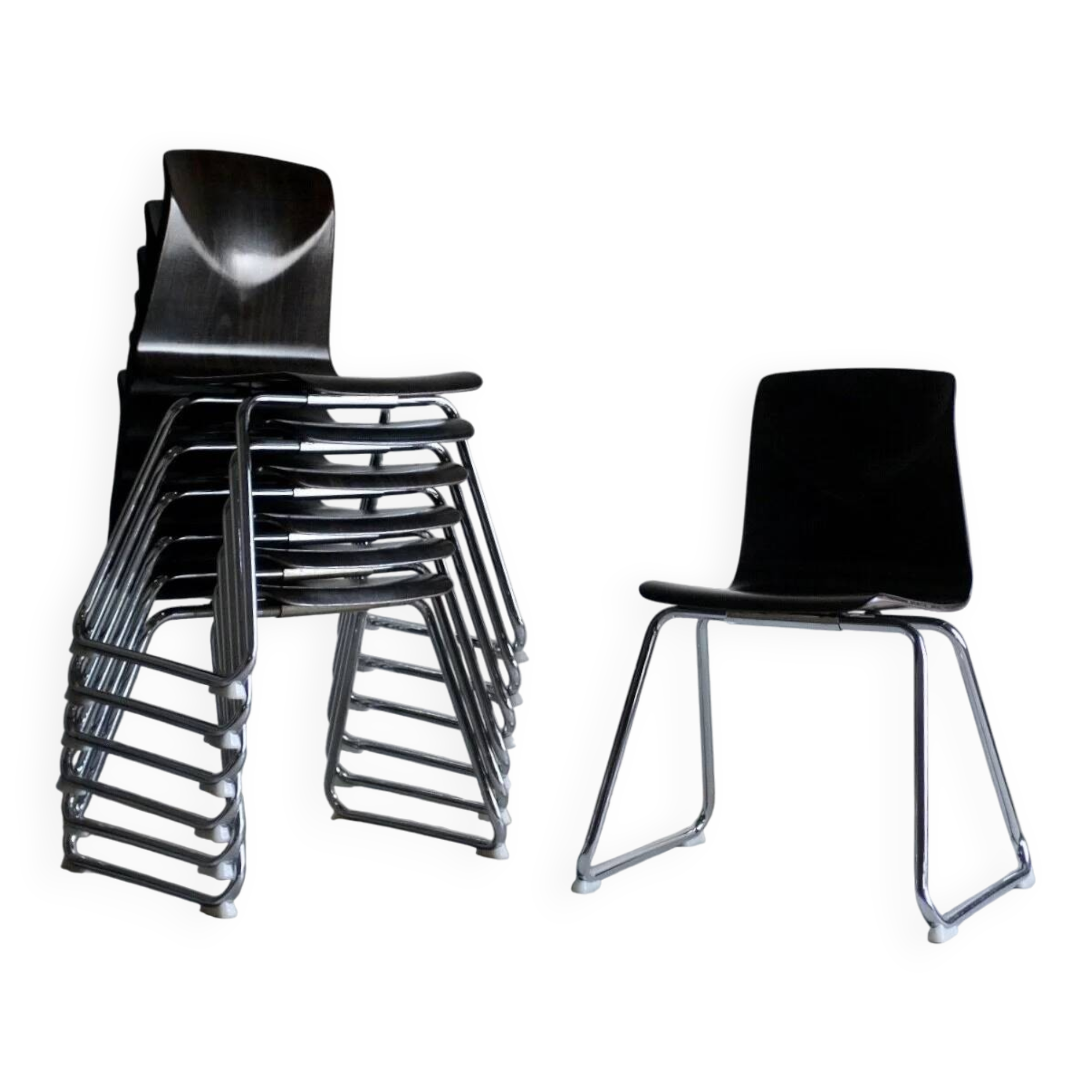 7 Pagholtz tubular steel stackable dining chairs | West Germany | 1960s