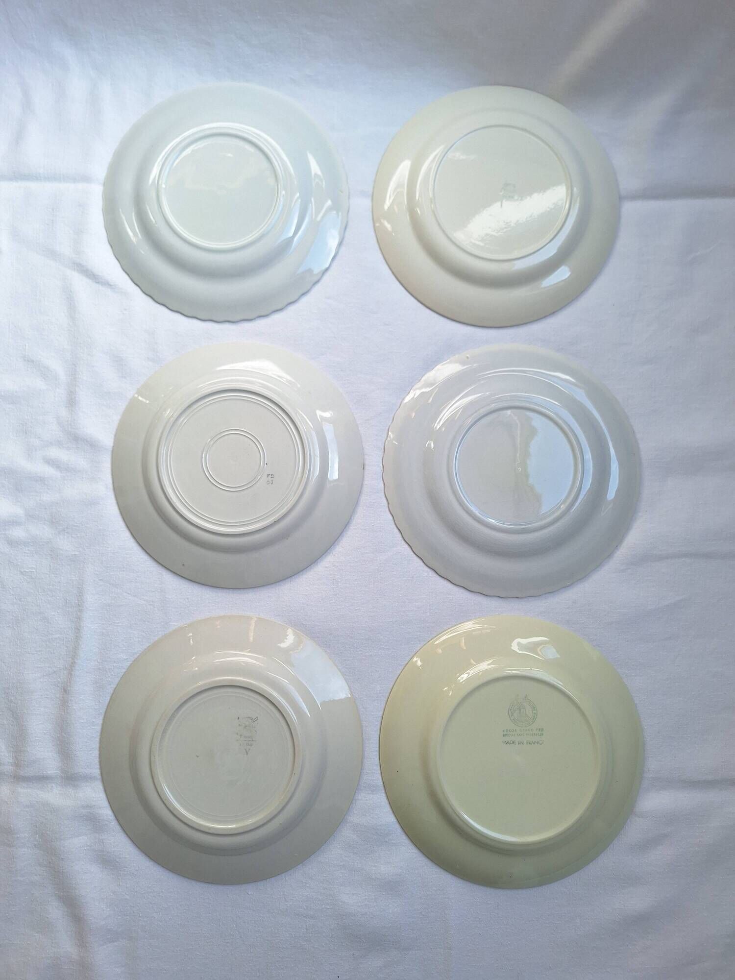 Multicolored flower dinner plates from Moulin des Loups, St Amand and Badonville
