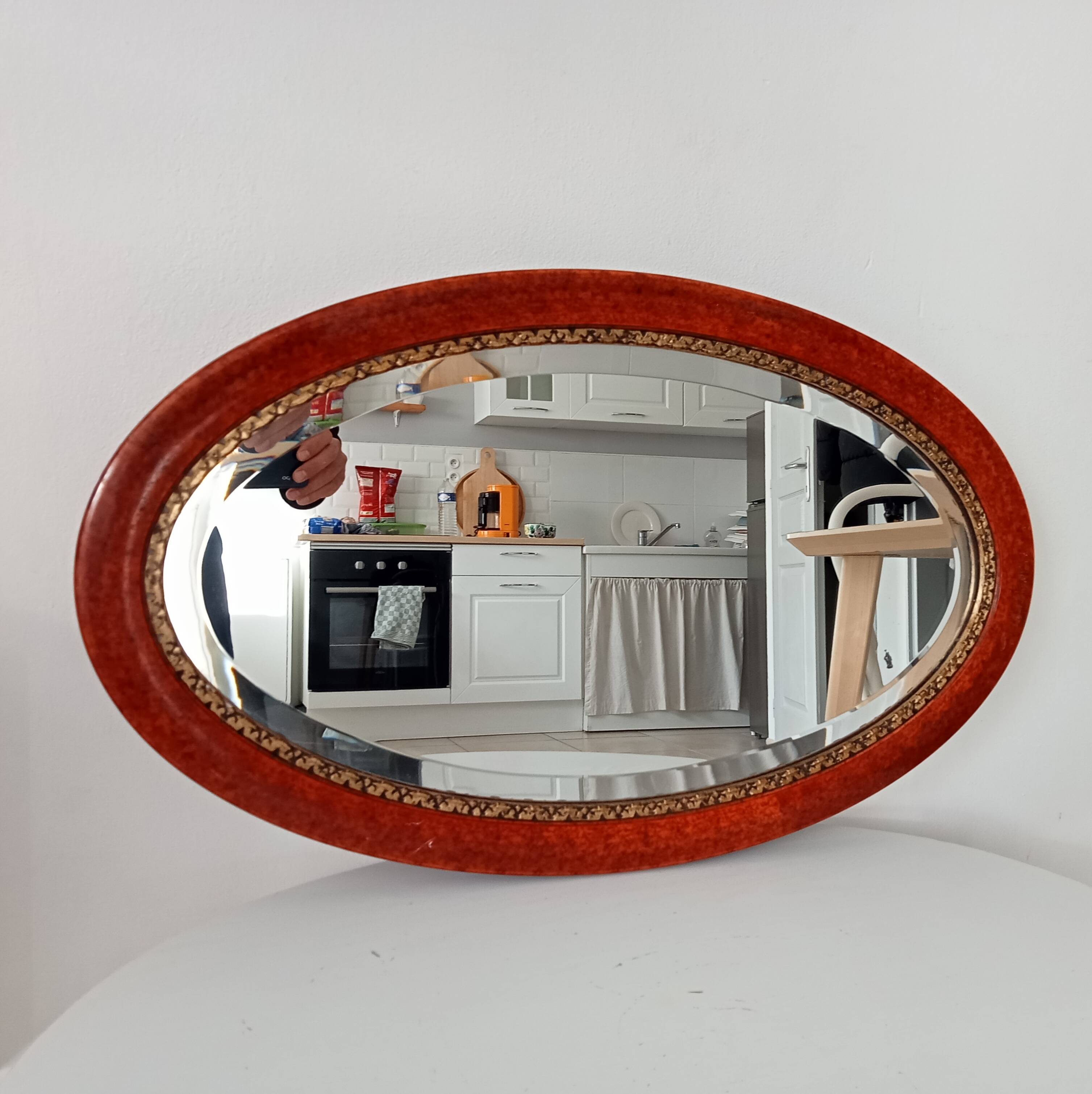 Antique oval mirror with bevelled glass