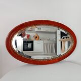 Antique oval mirror with bevelled glass