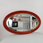 Antique oval mirror with bevelled glass