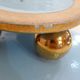 Art Deco modernist coupe, with a base of 3 spheres, in turquoise ceramic and gilding.