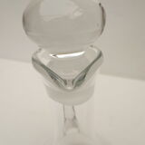 small glass decanter with its handle and spout