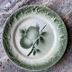 11 old dessert plates from the Pexonne earthenware factory, green and cream fruit decoration