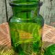 Duo of pots and jars apothecary style in green glass.