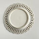 Pair of openwork porcelain plates decorated with roses