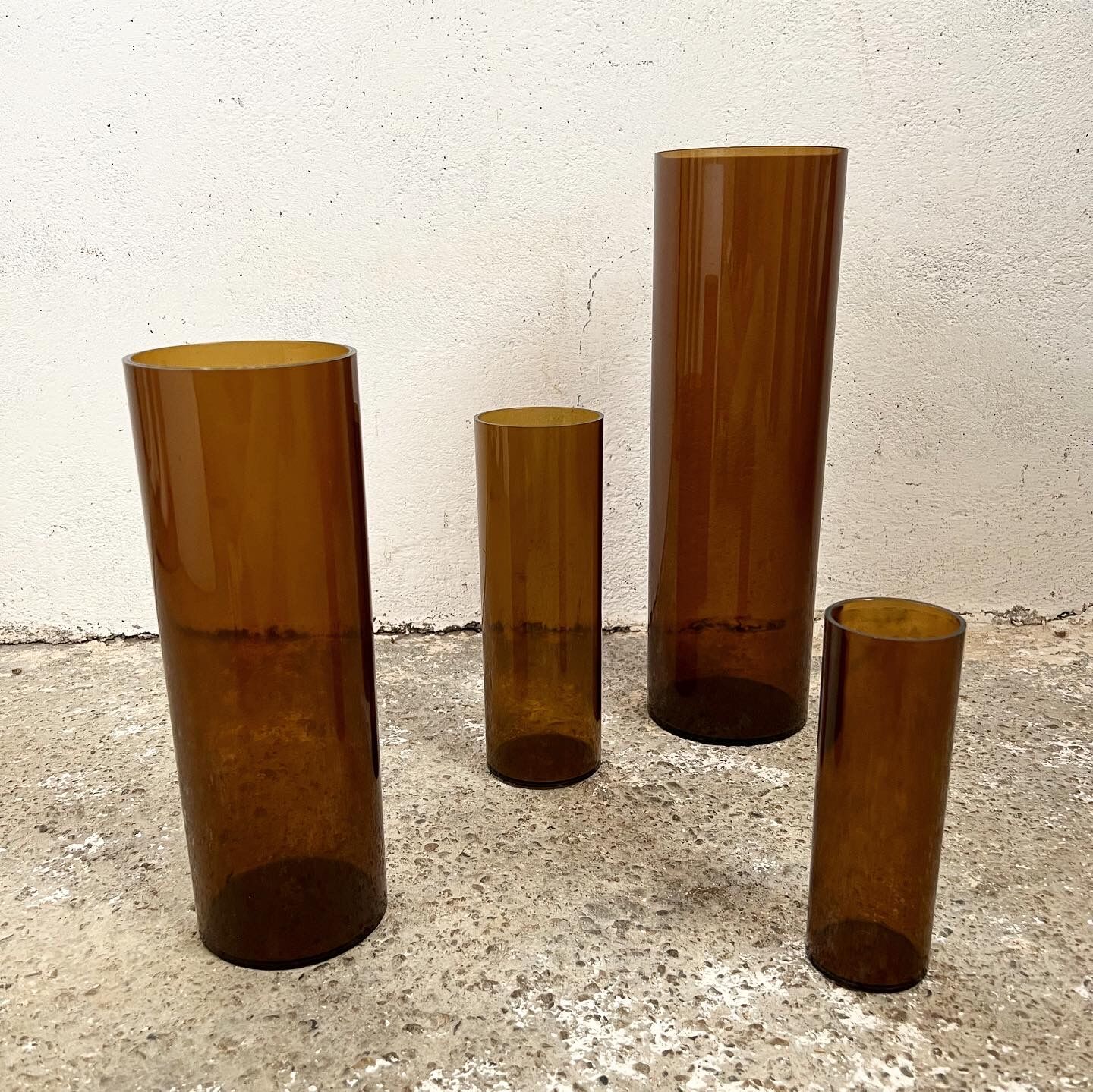 4 Jacques Bédat trundle vases in smoked plexiglass