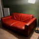 Red leather 2/3-seater sofa by Roche Bobois