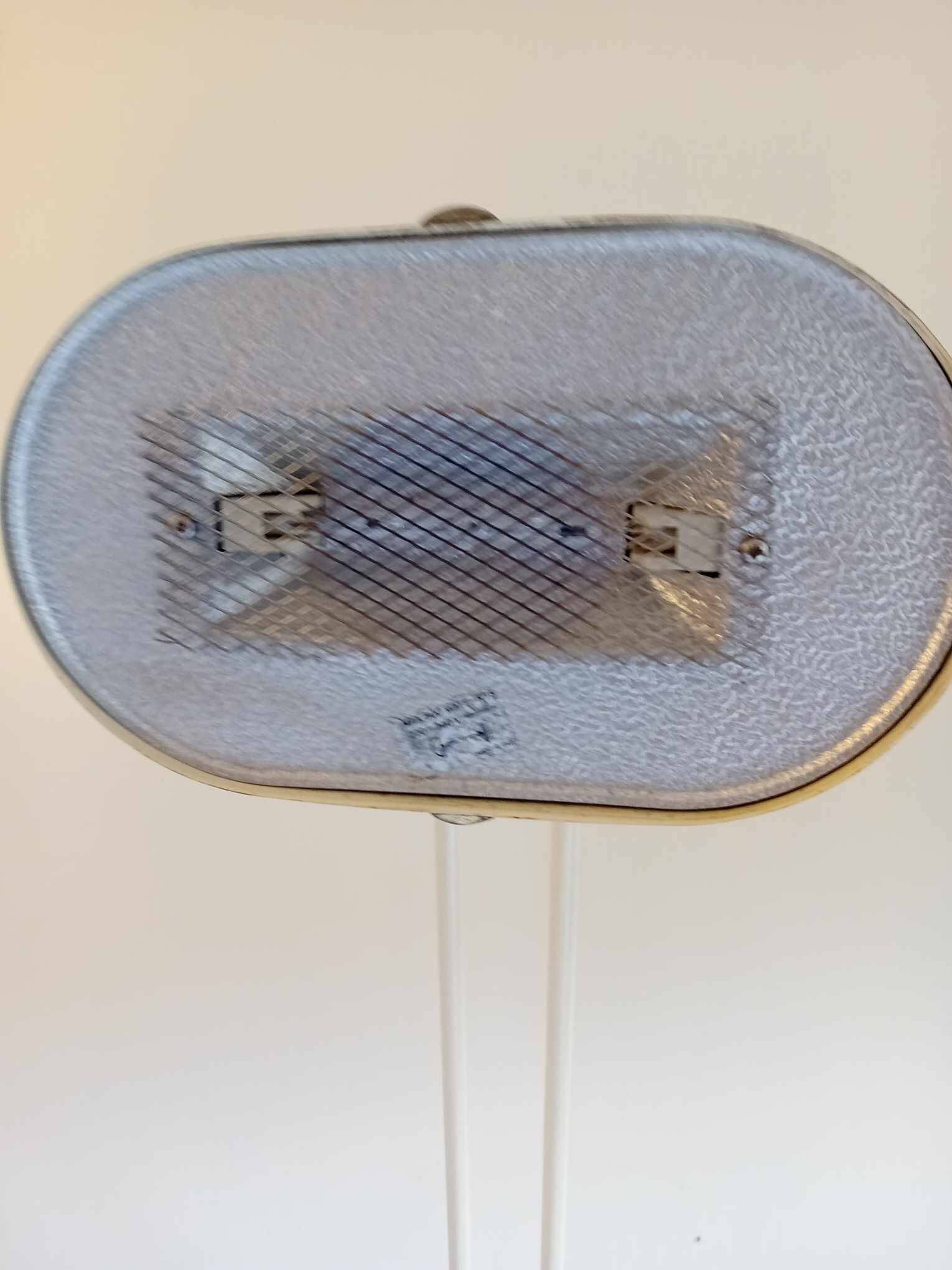 Italian floor lamp from the 70s, “Fresh Butter” color, “Made In Italy” label.