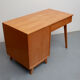 Bureau féminin des années 1950 en cendres