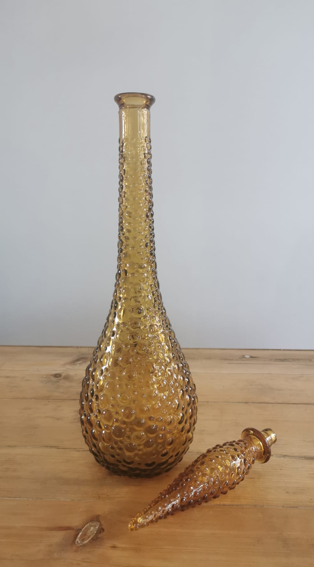 Amber-colored empoli glass decanter