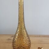 Amber-colored empoli glass decanter