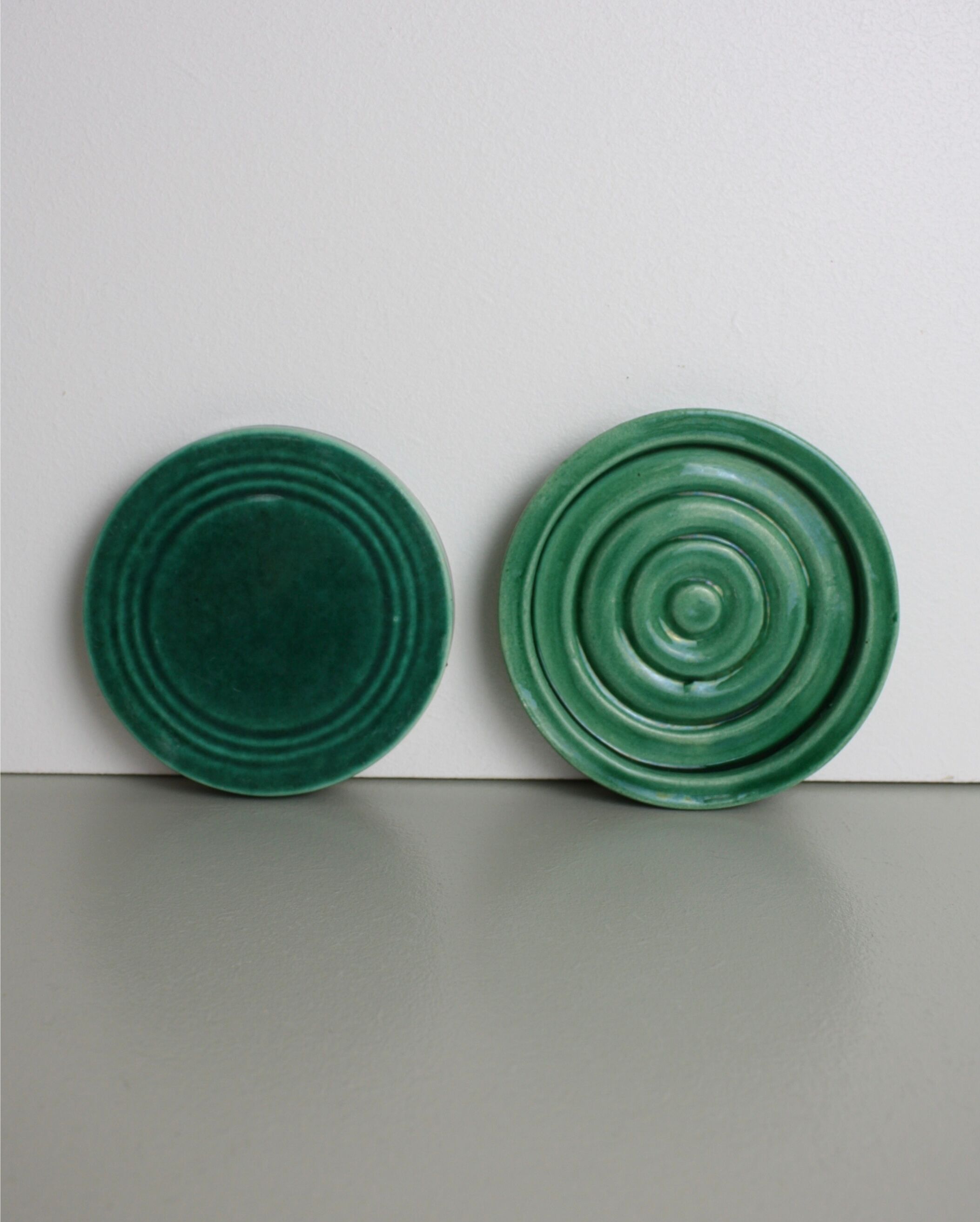 Set of 4 coasters in glass in green earthenware