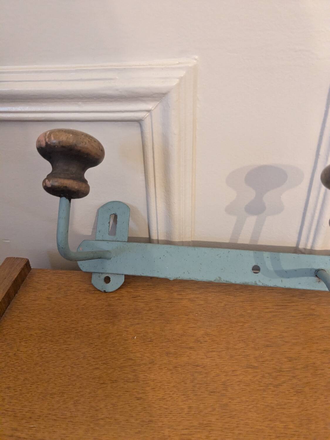 Vintage wall-mounted coat rack