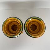Pair of ocher and green ceramic point-a-line candlesticks