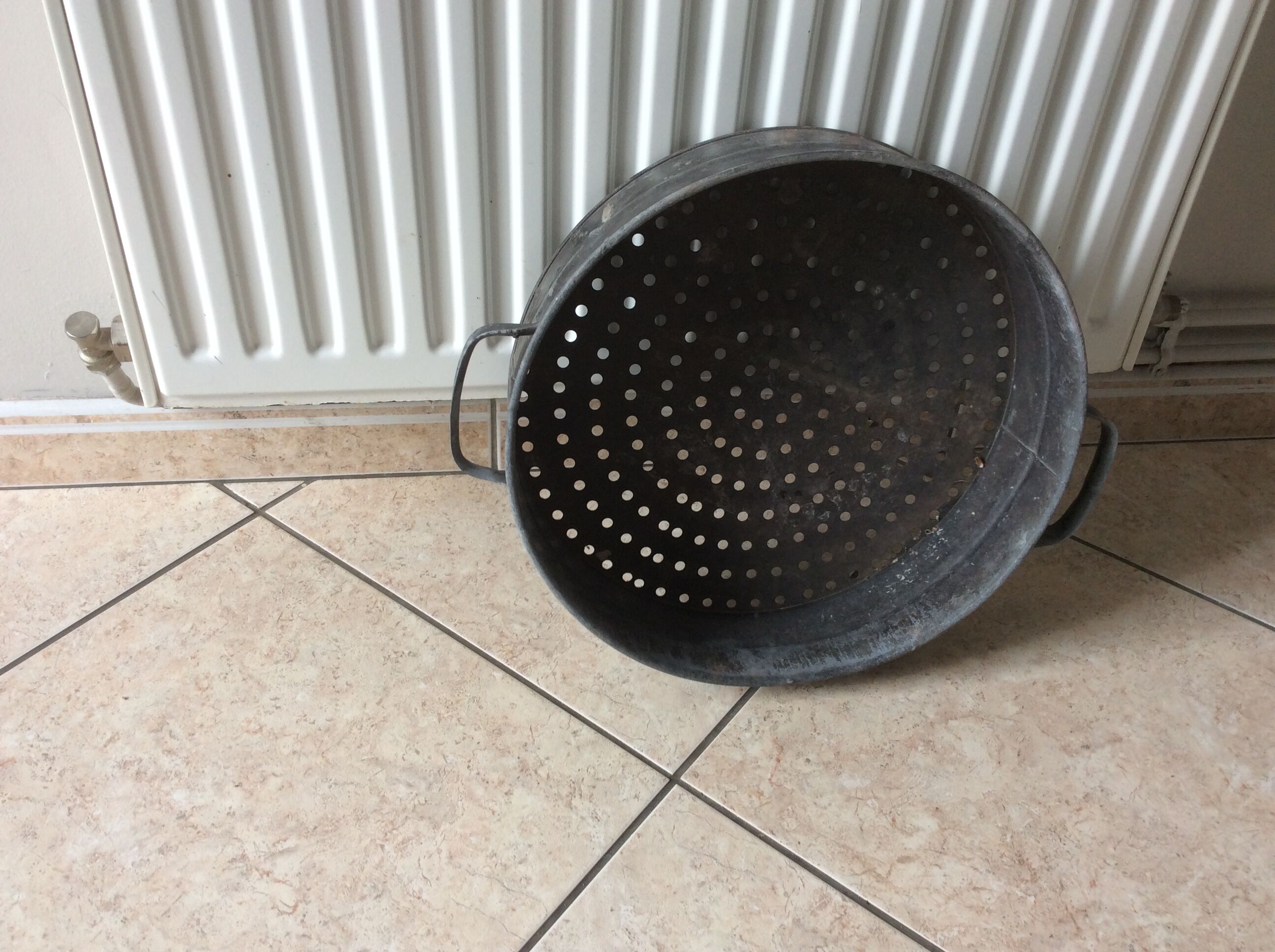 Ancient zinc sieve