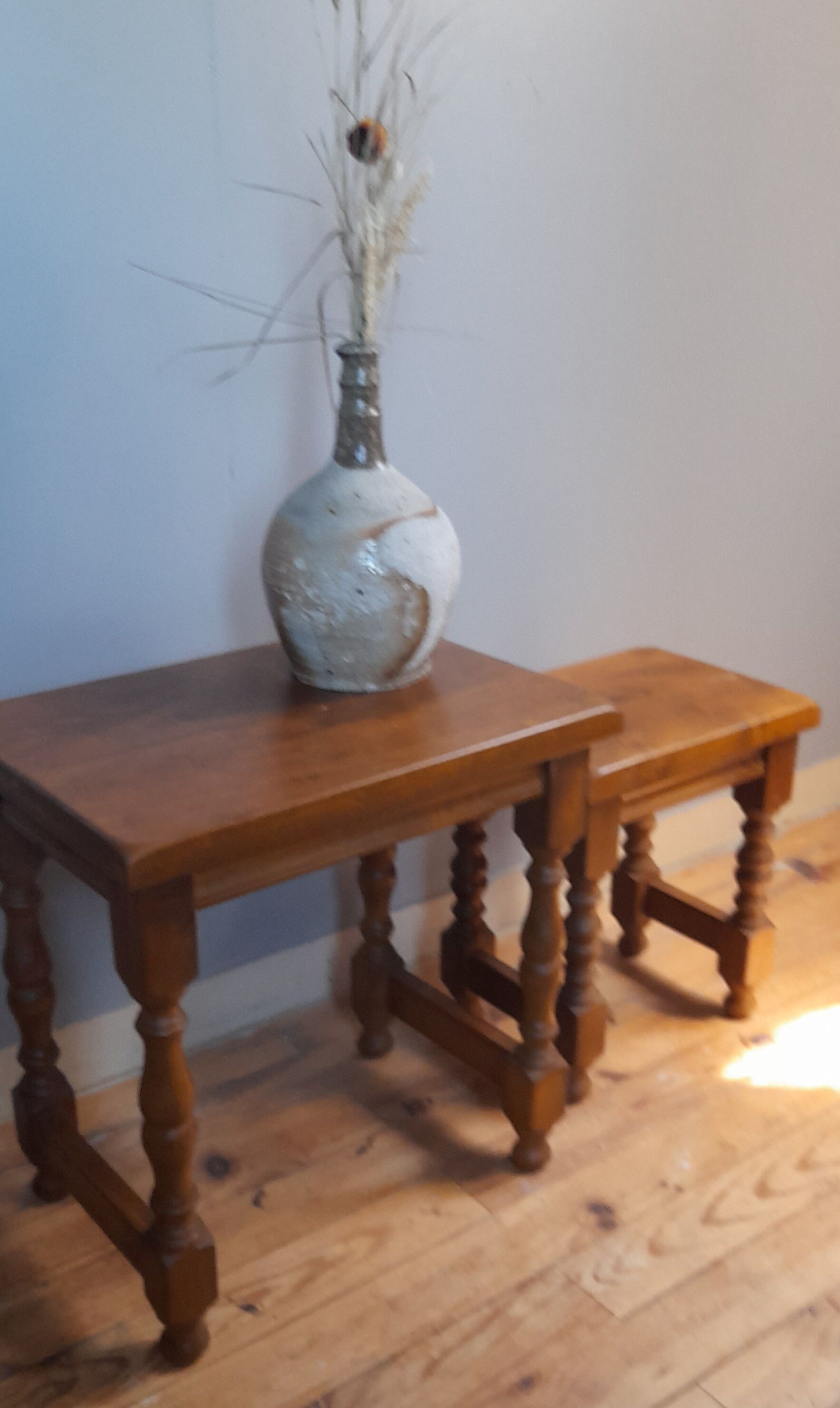 2 solid wood trundle tables, turned legs 80