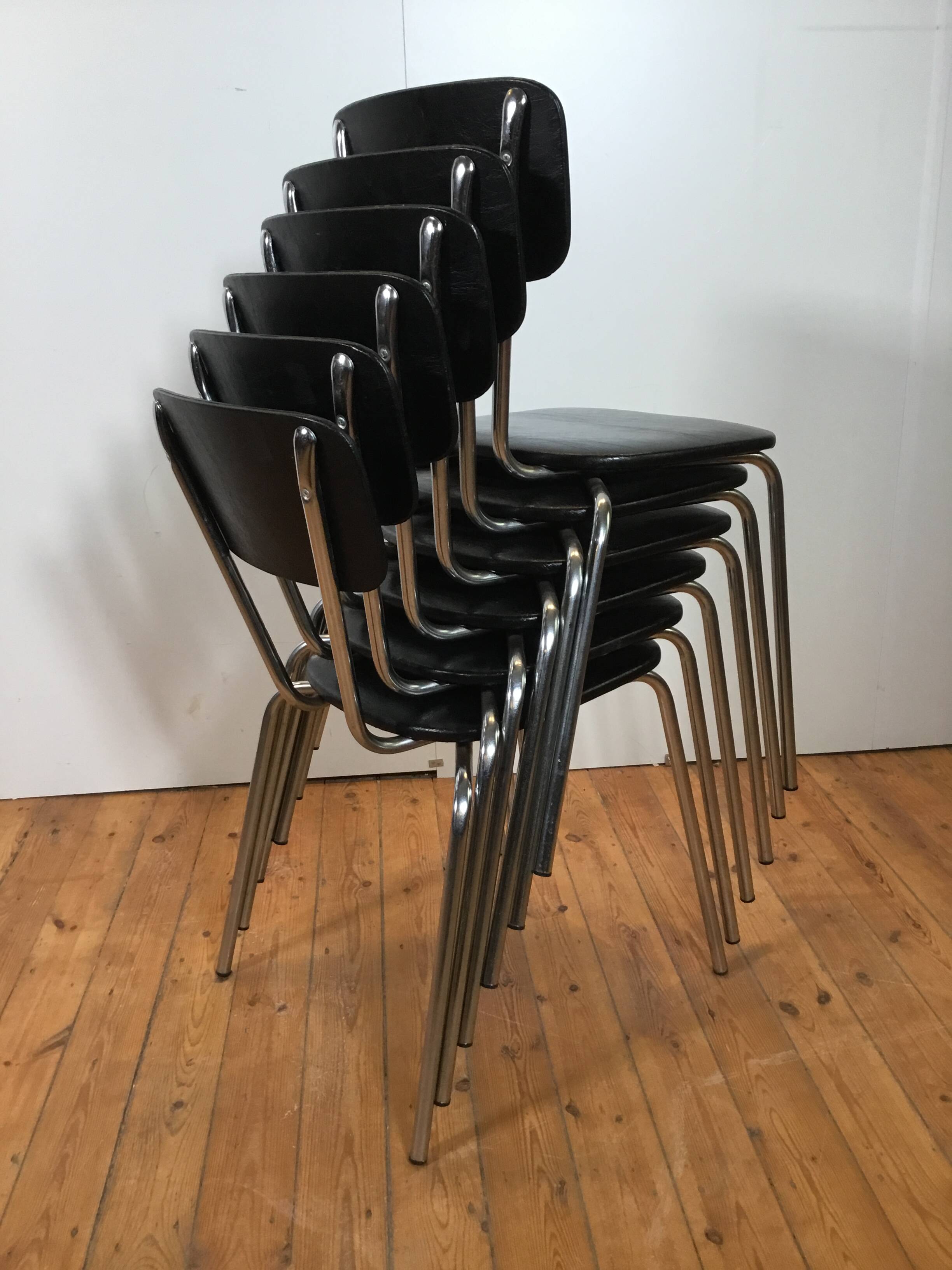 vintage chromed tubular steel stackable dining chairs