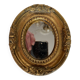 Small old mirror in gilded wood