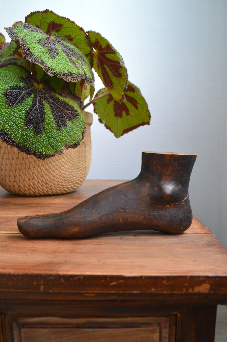 Carved wooden Buddha's foot