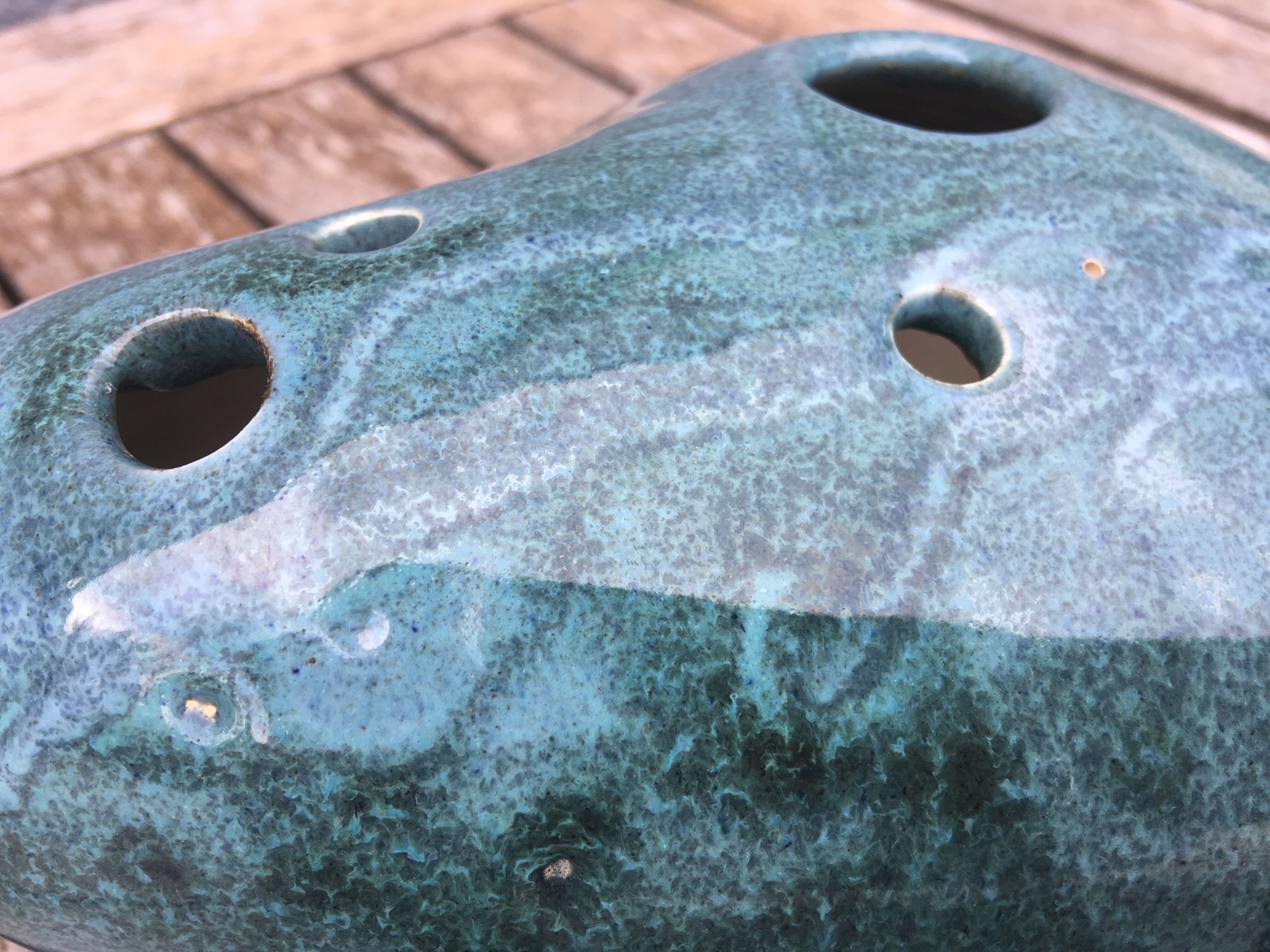 Roller spike flowers, blue-green ceramics