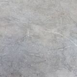 Vintage wooden buffet with a marble top.