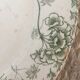 Flat old plates mismatched with flowers