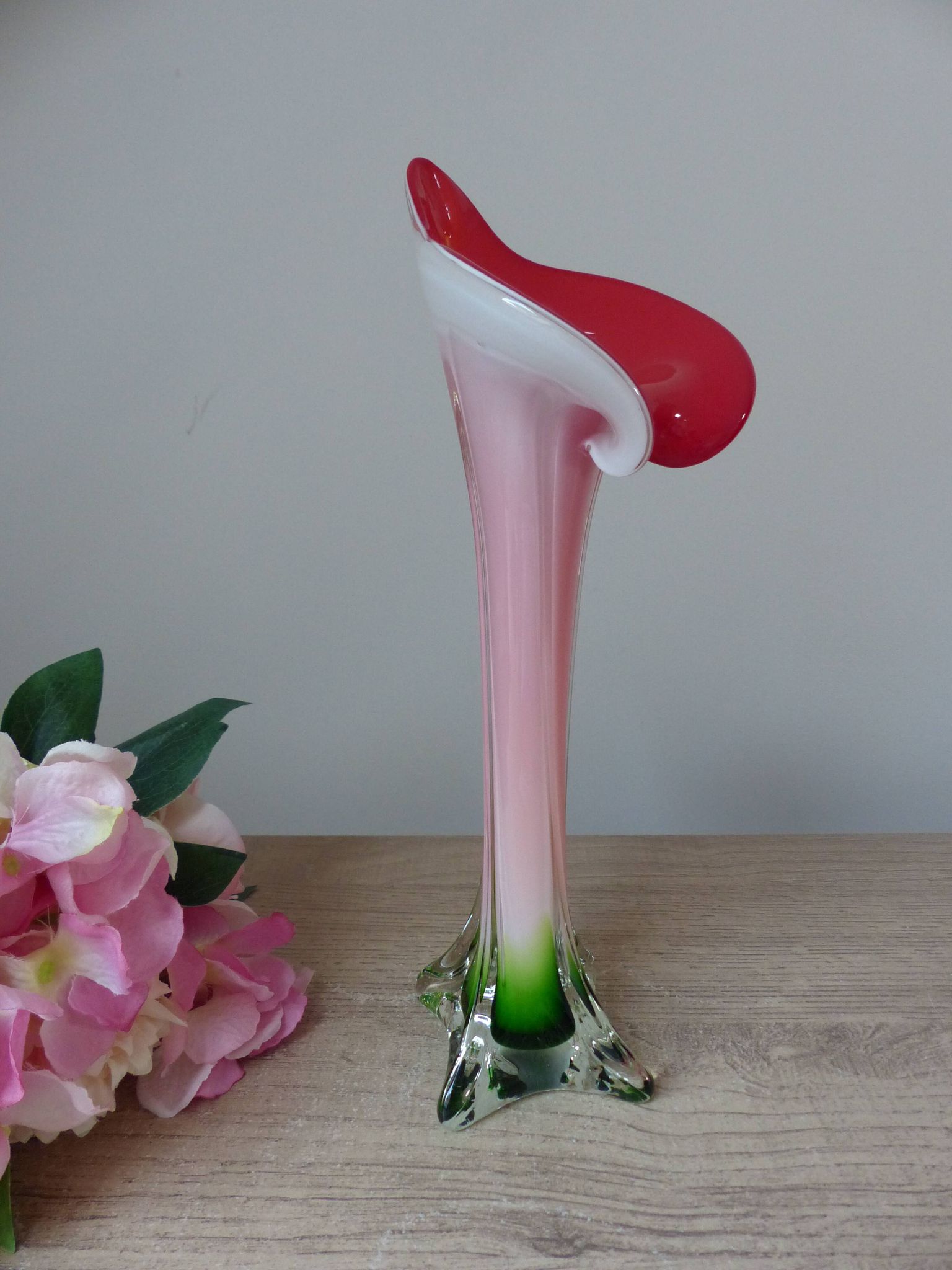 Vintage coloured blown glass vase in the shape of a calla lily.