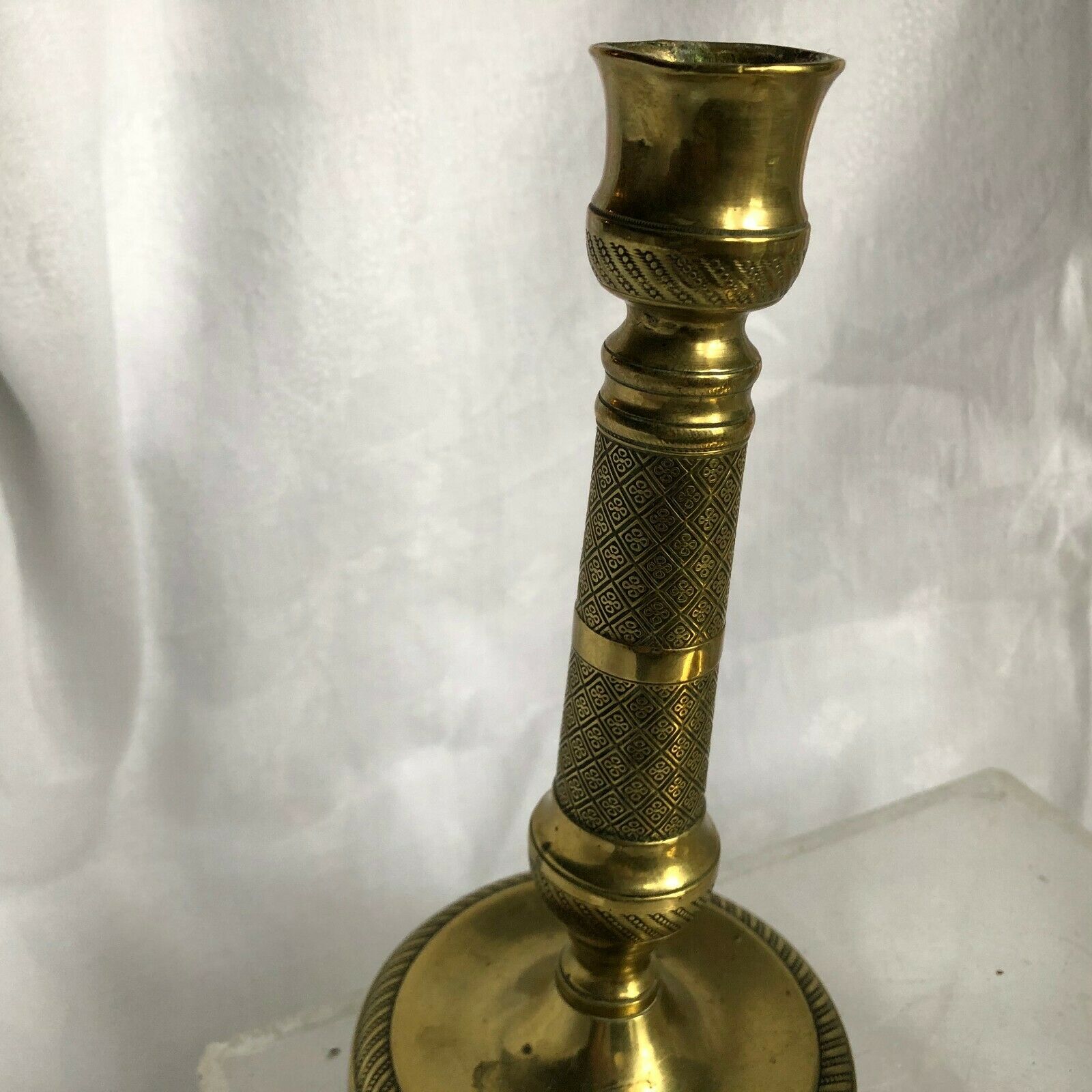 Pair of bronze and brass candlesticks