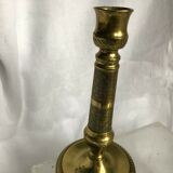 Pair of bronze and brass candlesticks