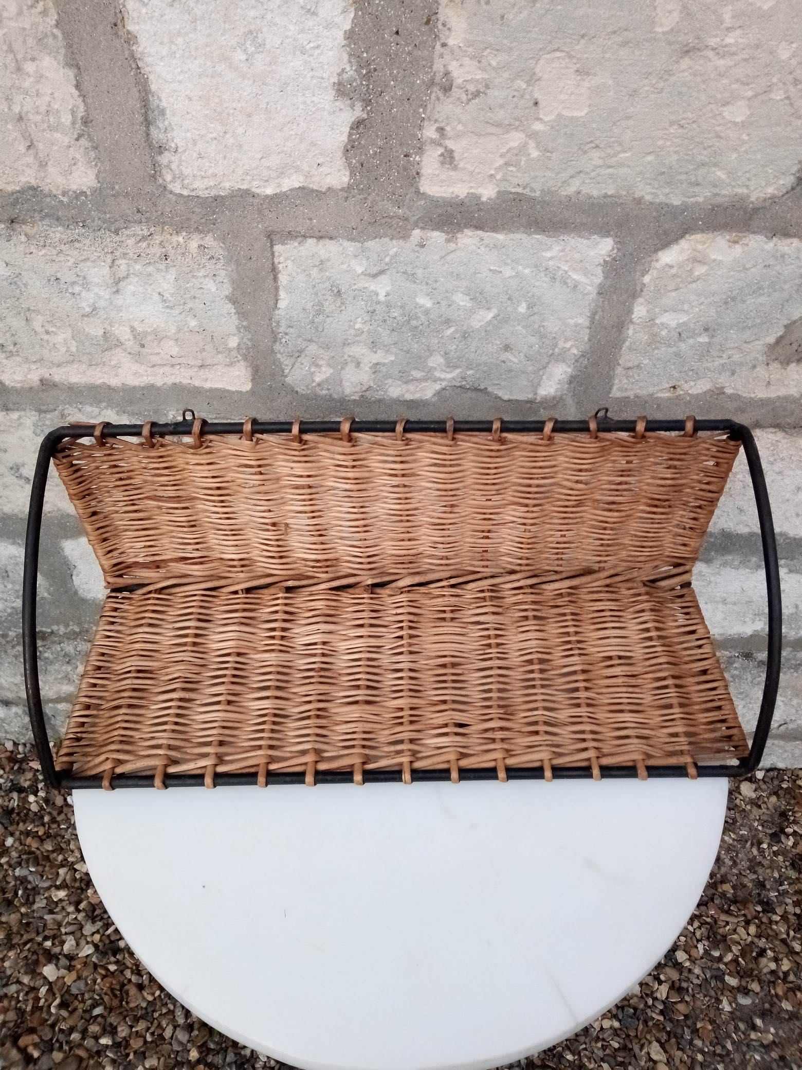 Rattan and steel shelf