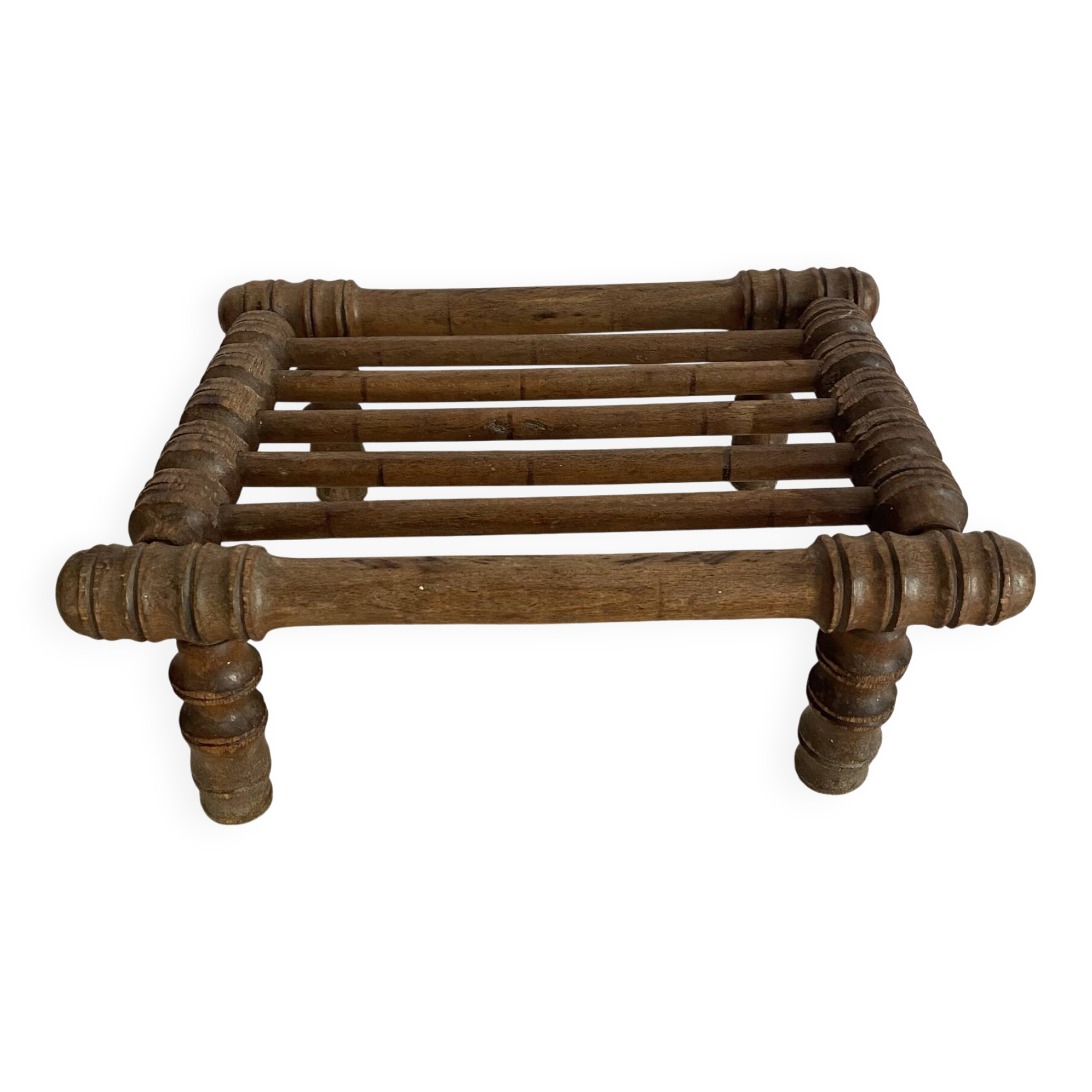 Old low turned wooden stool
