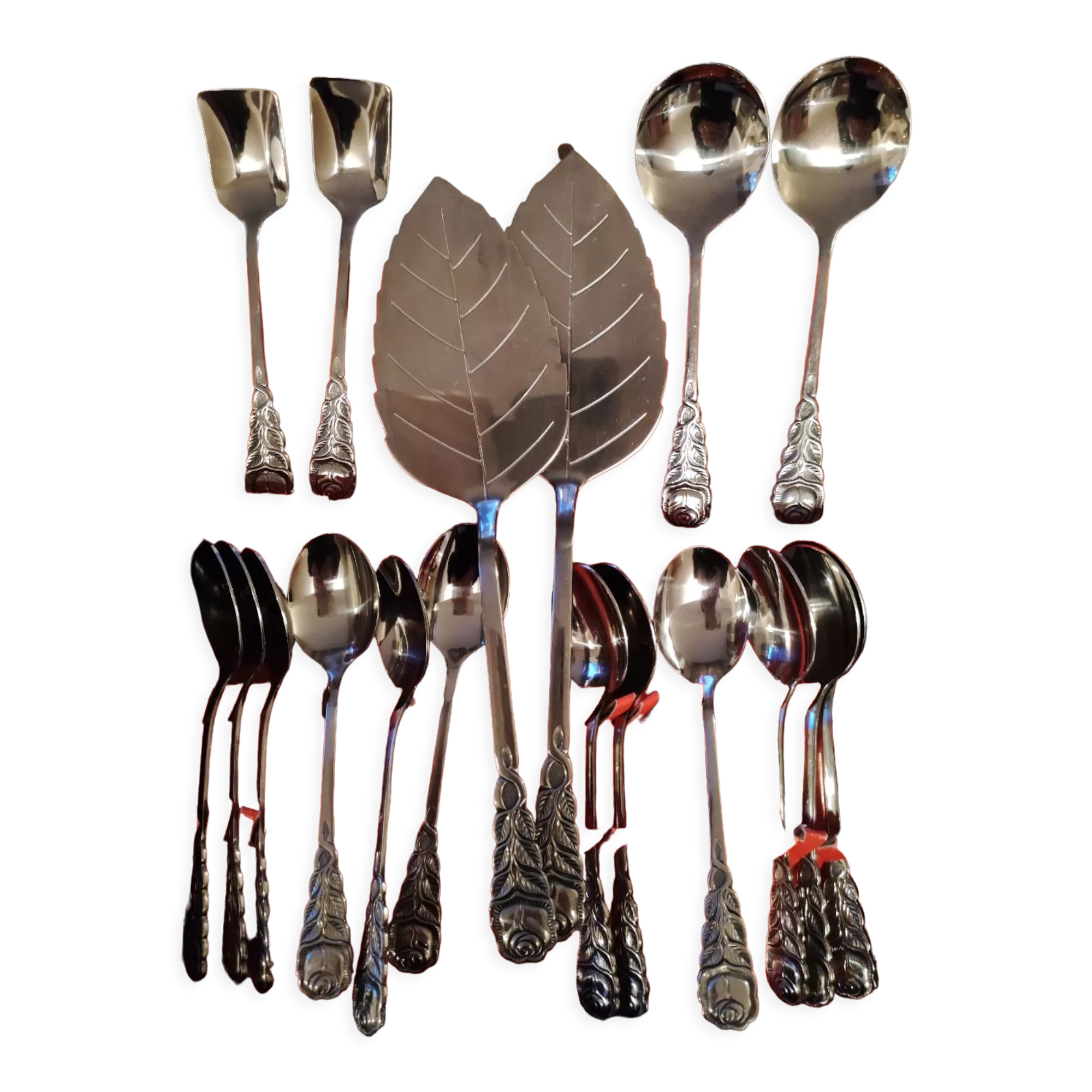 Stainless steel dessert/coffee service with 18 pieces. Rostfrei. Pink shape