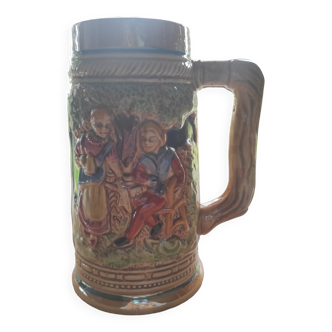 Vintage decorated, glazed and enameled ceramic beer mug