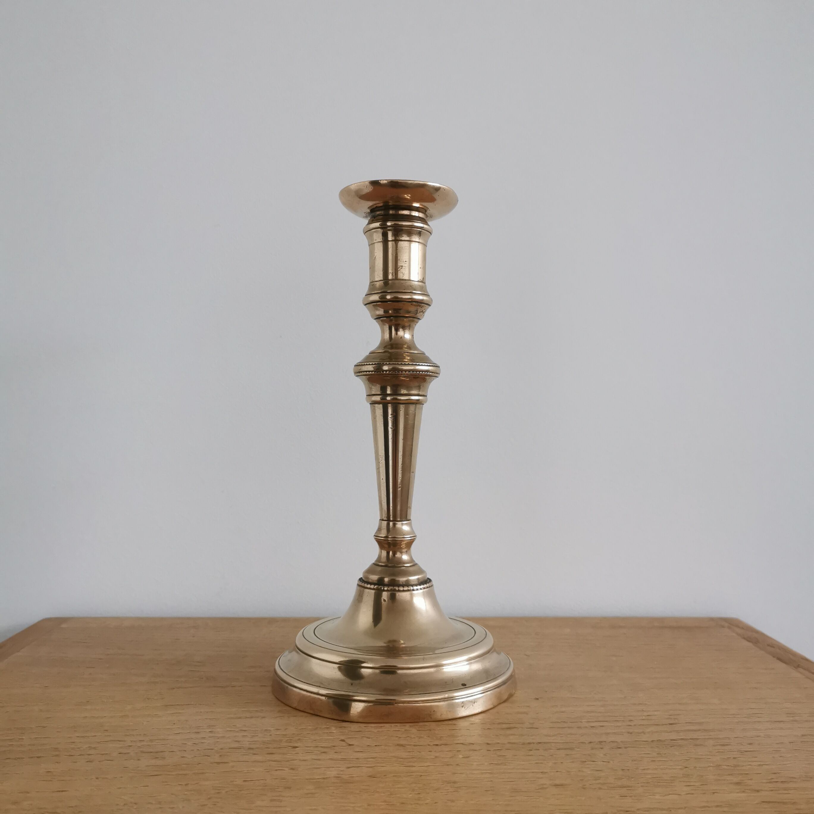 Antique brass candle holder