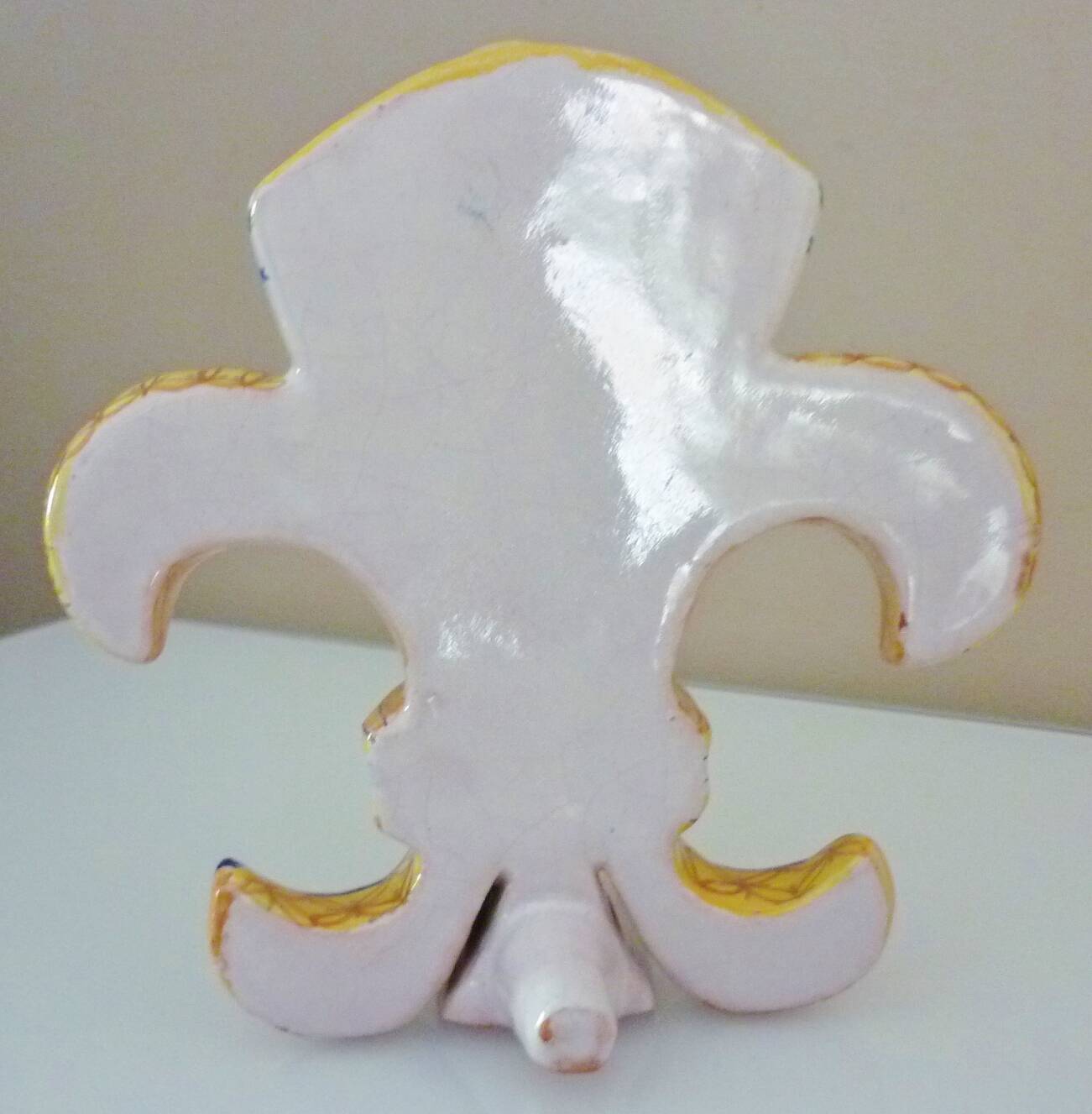 Fleur-de-lis shaped vase, glazed ceramic, Brittany, Quimper, Breton ermines, character