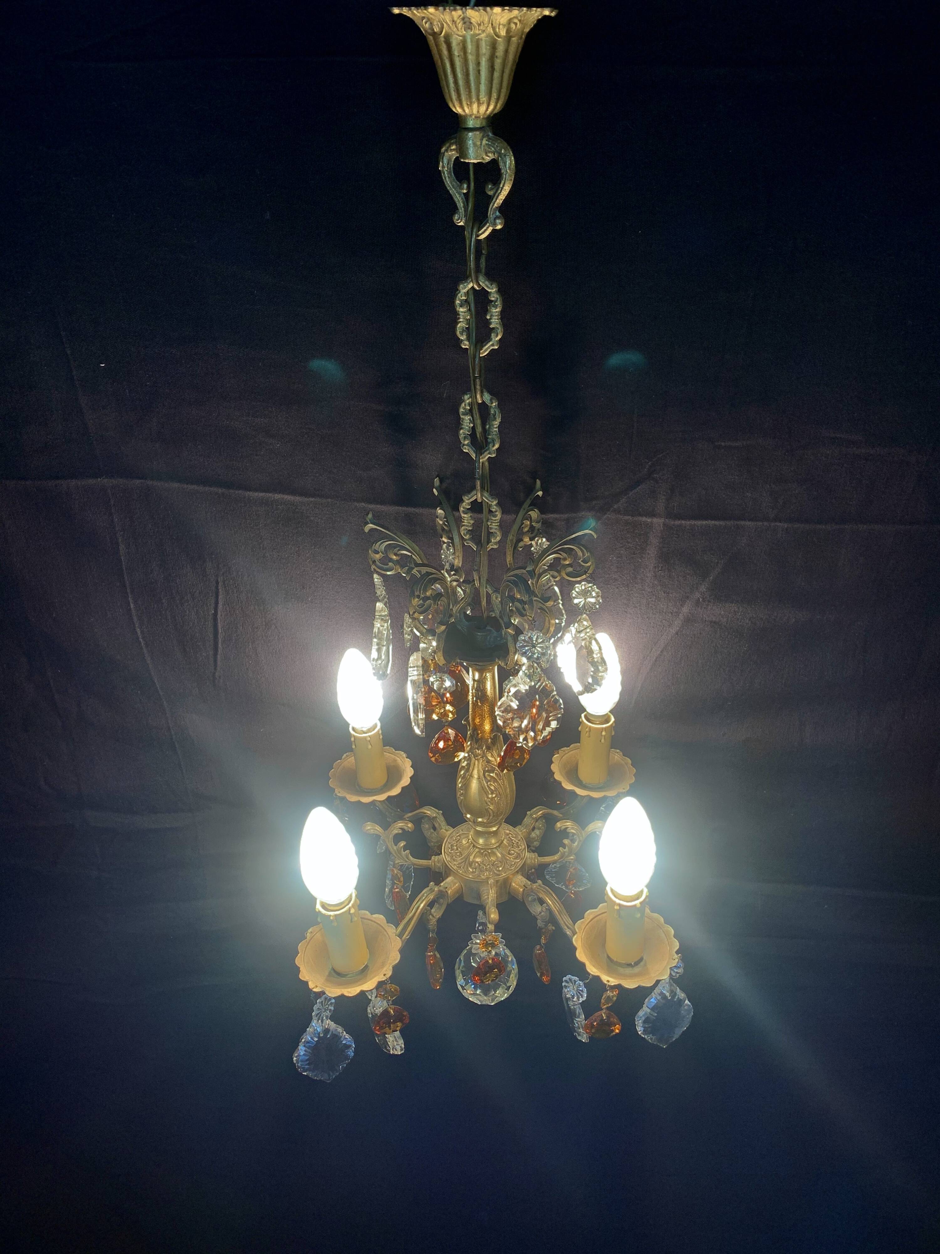 4 bronze lights and tassels chandelier