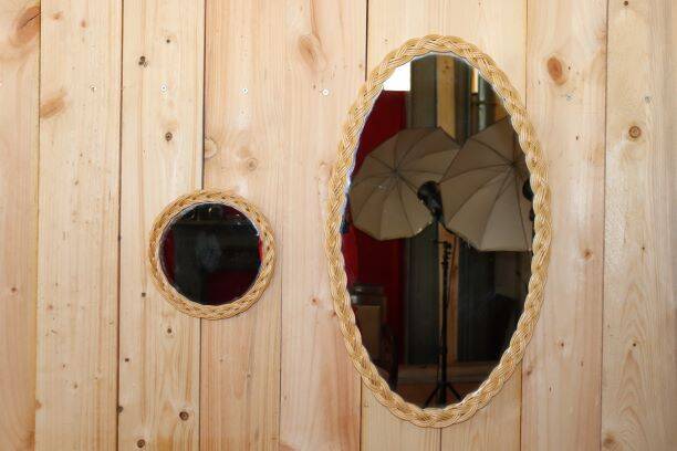 Lot two woven rattan mirror