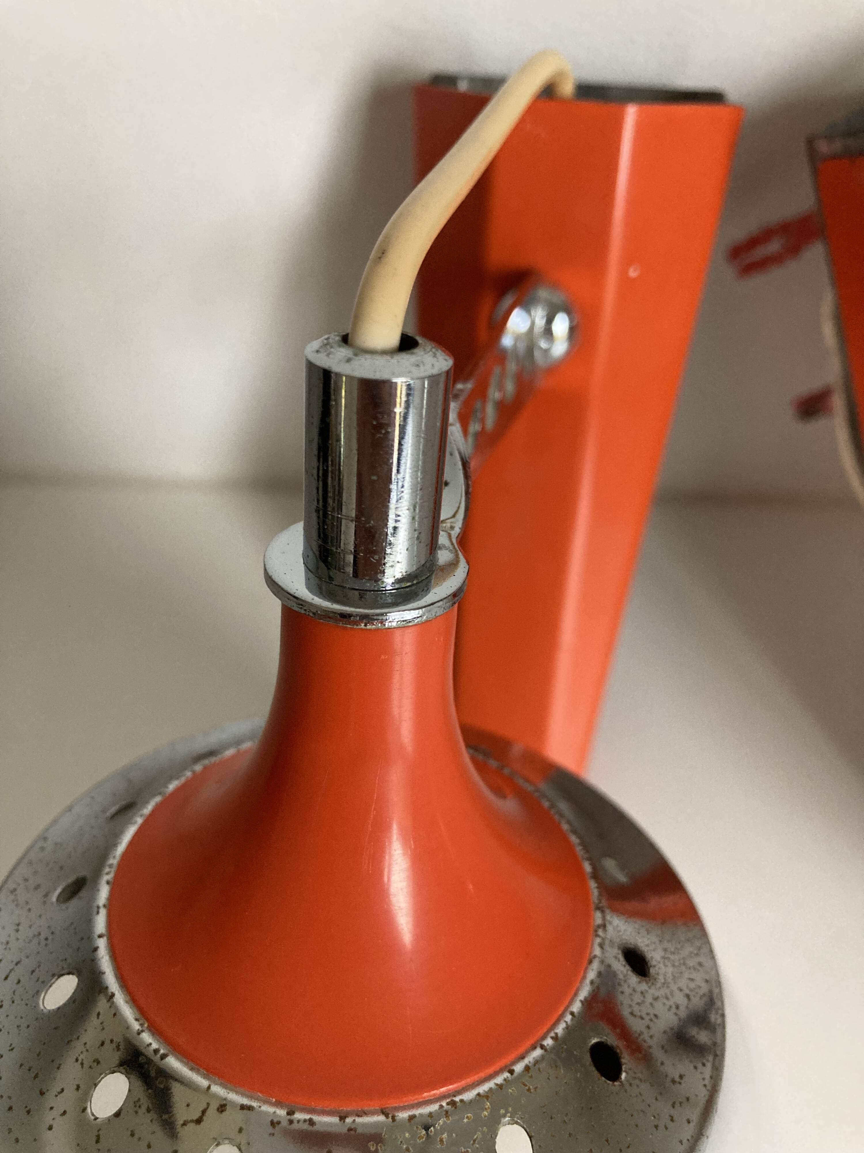 Set of two vintage orange wall lights from the 70s