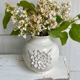 Small ceramic vase with floral relief