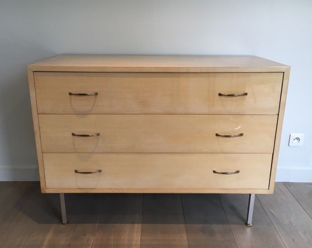 Eggshell lacquered chest of drawers with brushed steel legs. In the style of Knoll.