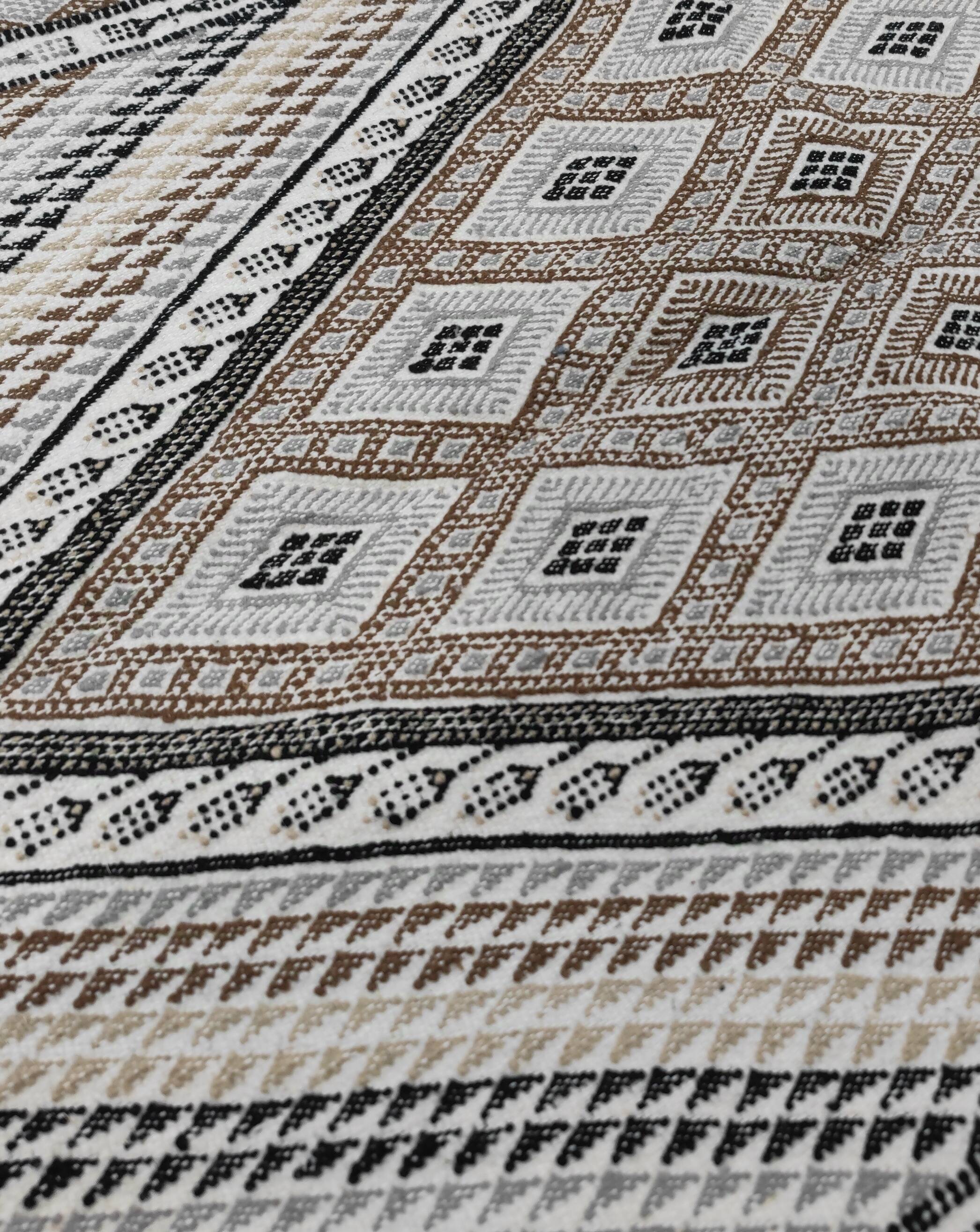 Hand-woven margoum rug in natural wool