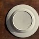 Set of 4 small dessert plates with a vintage stylised flower pattern.