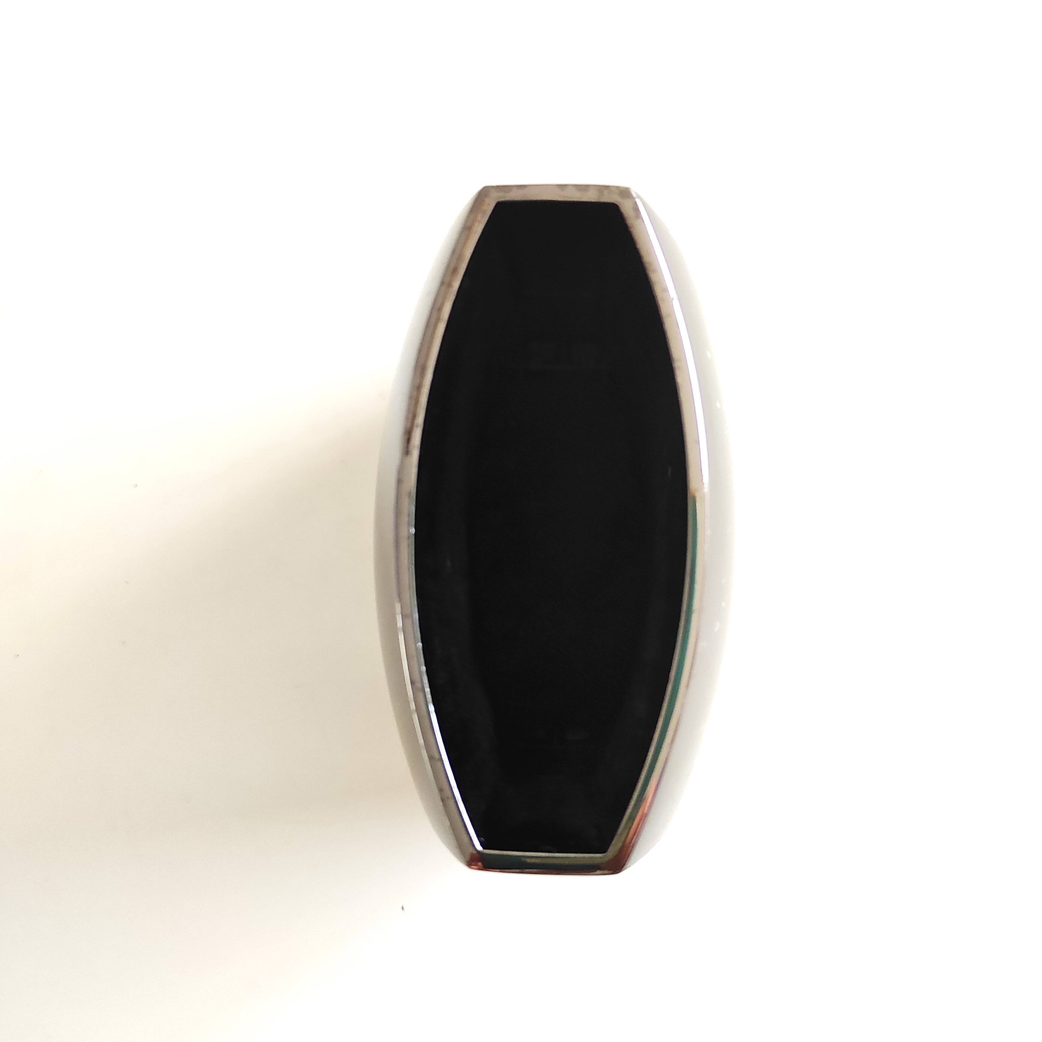 CERRUTI pen holder in chrome steel with these punches